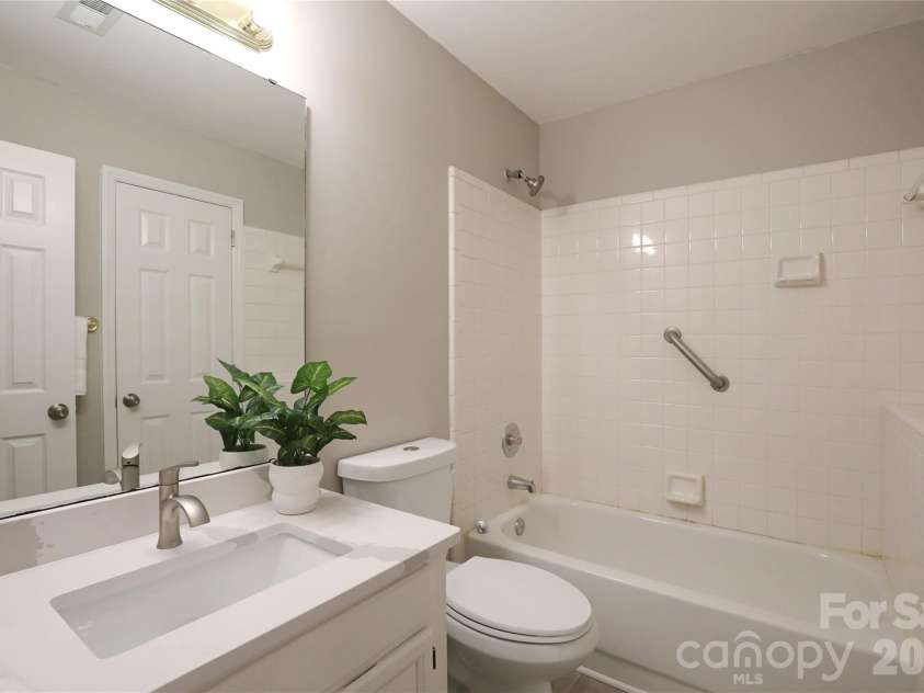 5909 Amity Springs Drive, Charlotte, NC 28212.  MLS# CAR4409733, YatesRealty ID 42616. Secondary bathroom