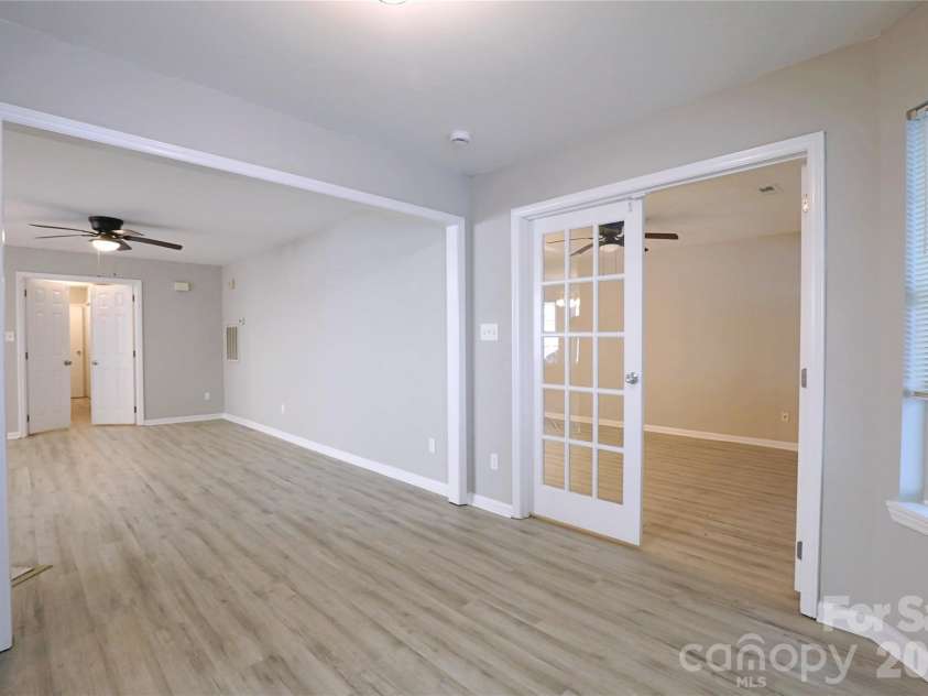 5909 Amity Springs Drive, Charlotte, NC 28212.  MLS# CAR4409733, YatesRealty ID 42616. View from flex space into primary bedroom.