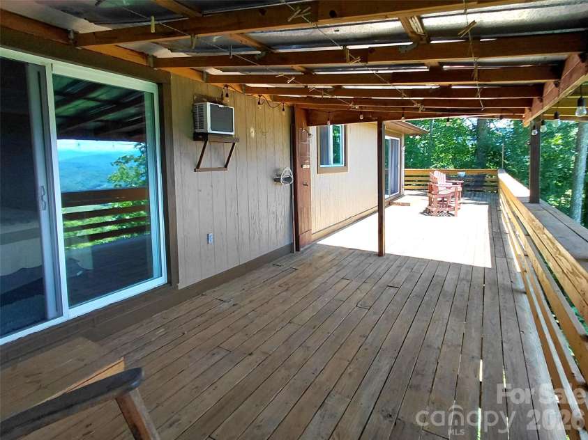 314 Blackberry Lane, Clyde, NC 28721.  MLS# CAR4388492, YatesRealty ID 42632. Back covered deck