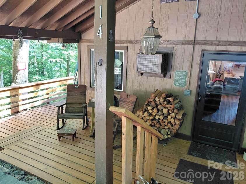 314 Blackberry Lane, Clyde, NC 28721.  MLS# CAR4388492, YatesRealty ID 42632. Covered front deck