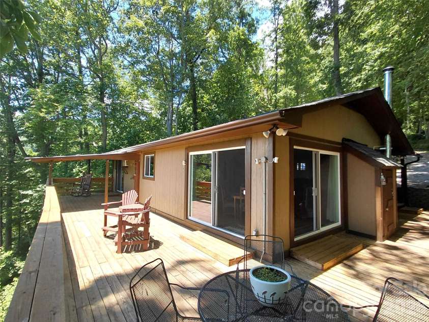 314 Blackberry Lane, Clyde, NC 28721.  MLS# CAR4388492, YatesRealty ID 42632. Rear deck facing views