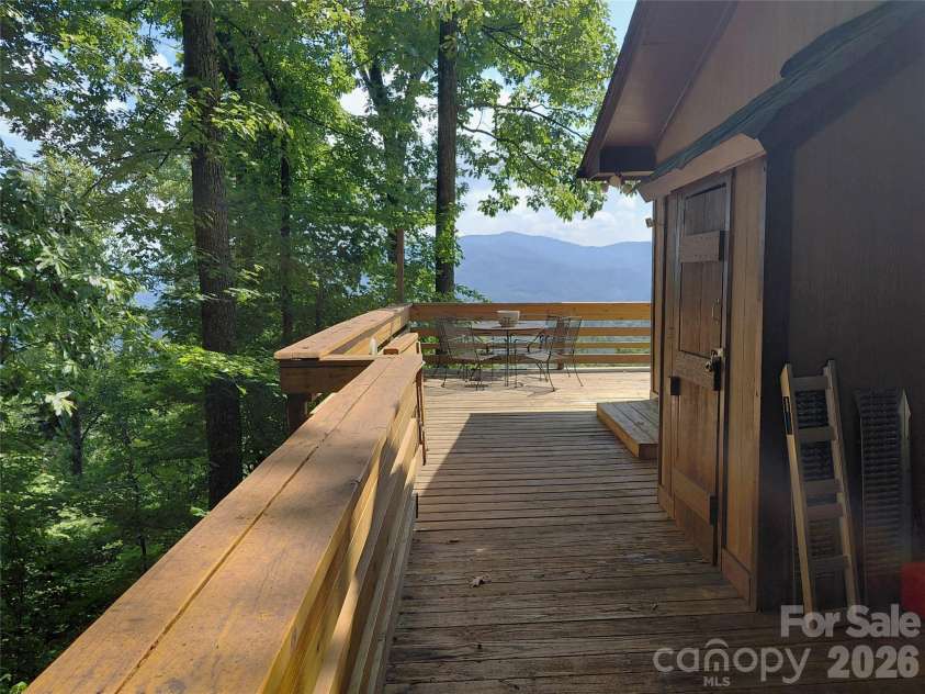 314 Blackberry Lane, Clyde, NC 28721.  MLS# CAR4388492, YatesRealty ID 42632. Side deck