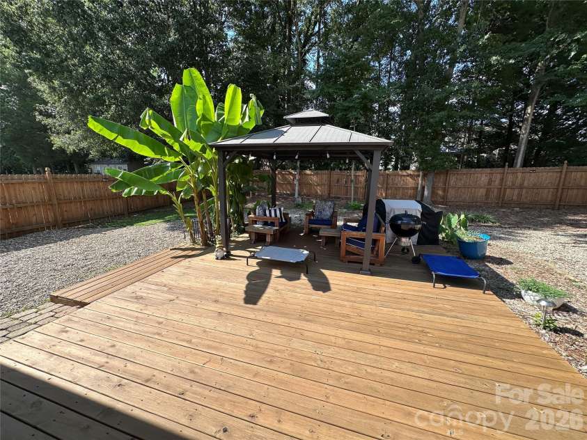 4515 Fox Thorne Drive, Charlotte, NC 28216.  MLS# CAR4411872, YatesRealty ID 42635. Backyard deck and gazebo