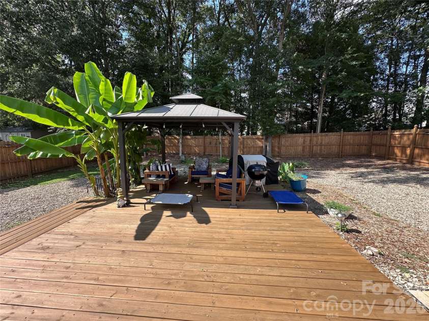 4515 Fox Thorne Drive, Charlotte, NC 28216.  MLS# CAR4411872, YatesRealty ID 42635. Backyard deck and gazebo