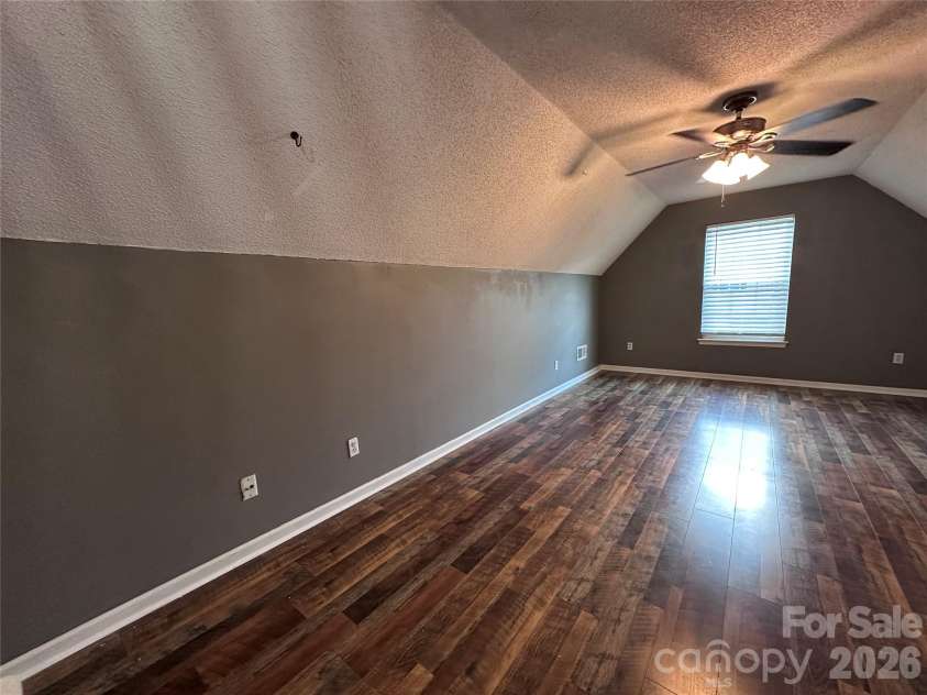 4515 Fox Thorne Drive, Charlotte, NC 28216.  MLS# CAR4411872, YatesRealty ID 42635. Room over garage