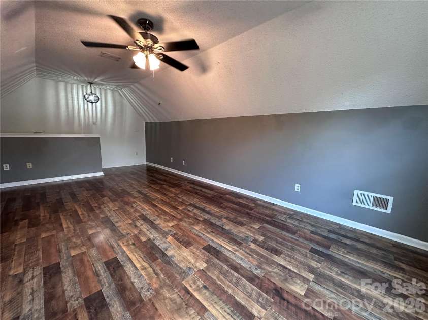 4515 Fox Thorne Drive, Charlotte, NC 28216.  MLS# CAR4411872, YatesRealty ID 42635. Room over garage