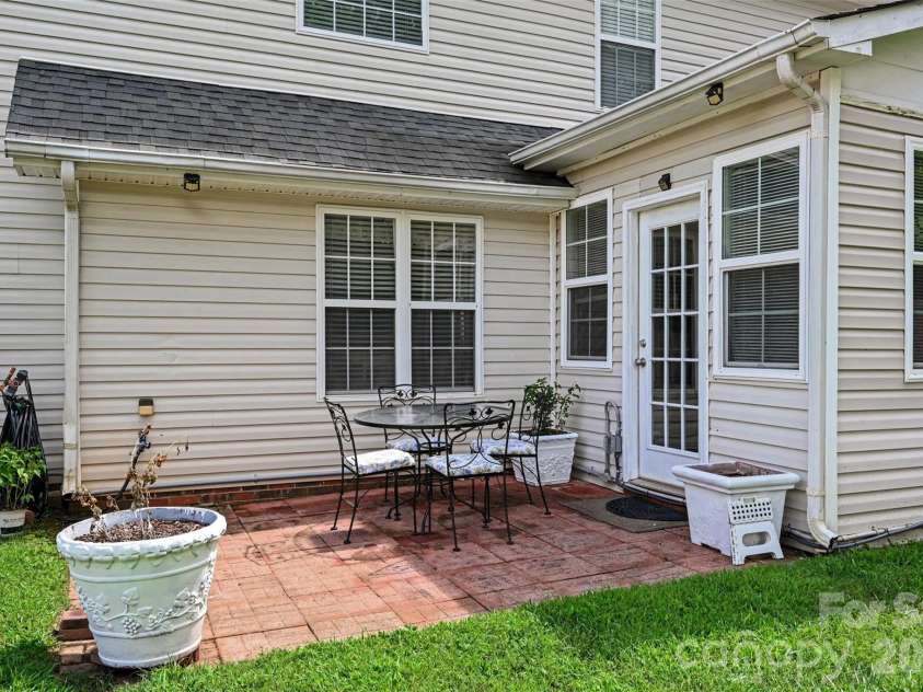 1707 Cottage Creek Road, Indian Trail, NC 28079.  MLS# CAR4411120, YatesRealty ID 42642. Back patio