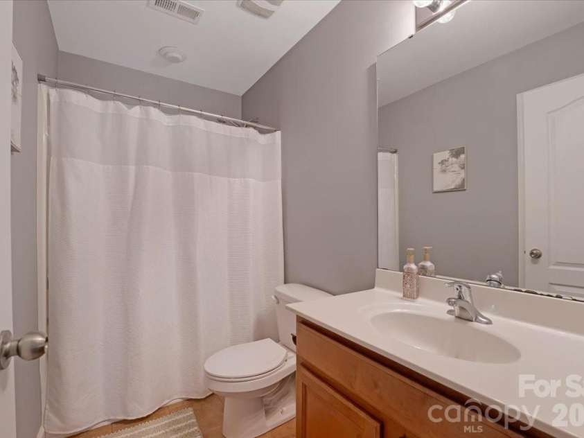13055 Windy Lea Lane, Huntersville, NC 28078.  MLS# CAR4351204, YatesRealty ID 4265. Full bath on upper level  