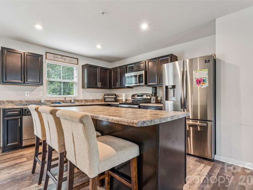 1076 Tangle Ridge Drive, Concord, NC 28025.  MLS# CAR4409915, YatesRealty ID 42651. 
