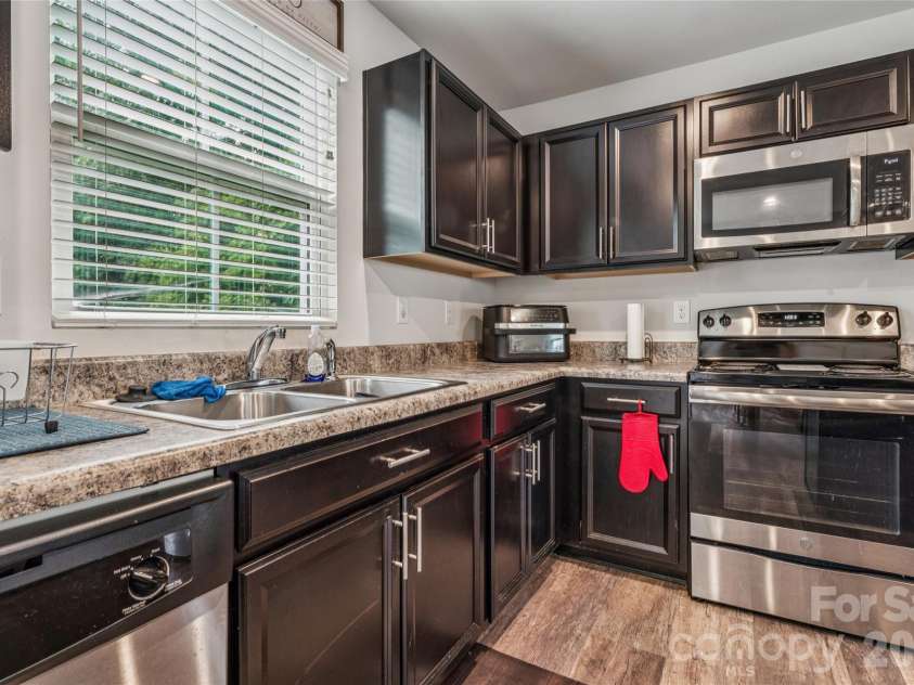 1076 Tangle Ridge Drive, Concord, NC 28025.  MLS# CAR4409915, YatesRealty ID 42651. 