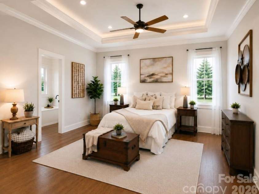 392 NC HWY 200 None, Stanfield, NC 28163.  MLS# CAR4406086, YatesRealty ID 42657. Rendering- primary bedroom w/ tray ceiling concept (trim surround lighting is an upgrade)
