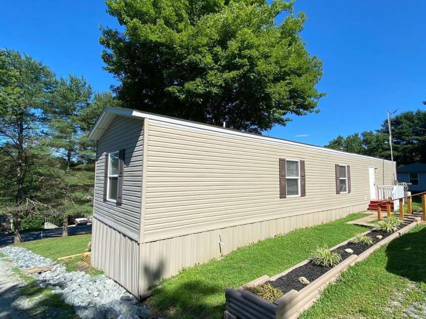 104 Fox Ridge Drive, Hendersonville, NC 28739.  MLS# CAR4412964, YatesRealty ID 42663. Back of home