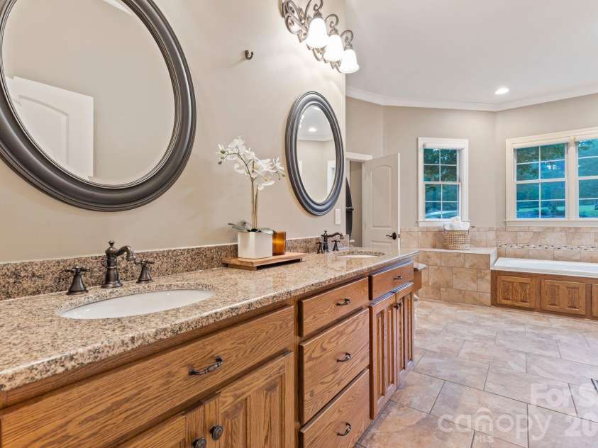 200 Timber Lake Drive, Troutman, NC 28166.  MLS# CAR4391540, YatesRealty ID 42665. Primary Bath