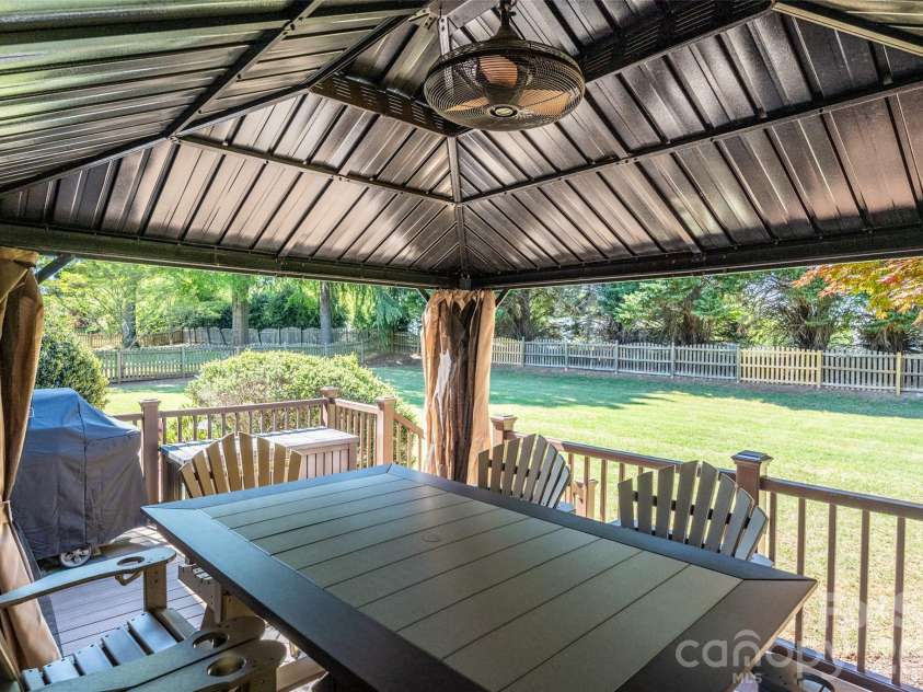119 Topsail Place, Mooresville, NC 28117.  MLS# CAR4379024, YatesRealty ID 42667. Deck overlooking level backyard