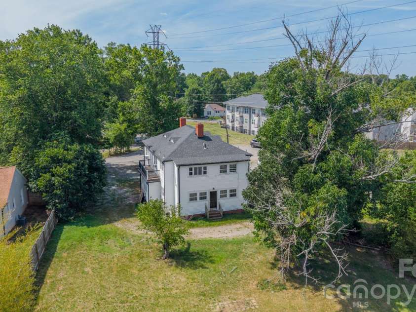 14 Mills Avenue, Concord, NC 28027.  MLS# CAR4403802, YatesRealty ID 42670. Back Exterior