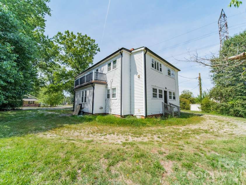 14 Mills Avenue, Concord, NC 28027.  MLS# CAR4403802, YatesRealty ID 42670. Back Exterior