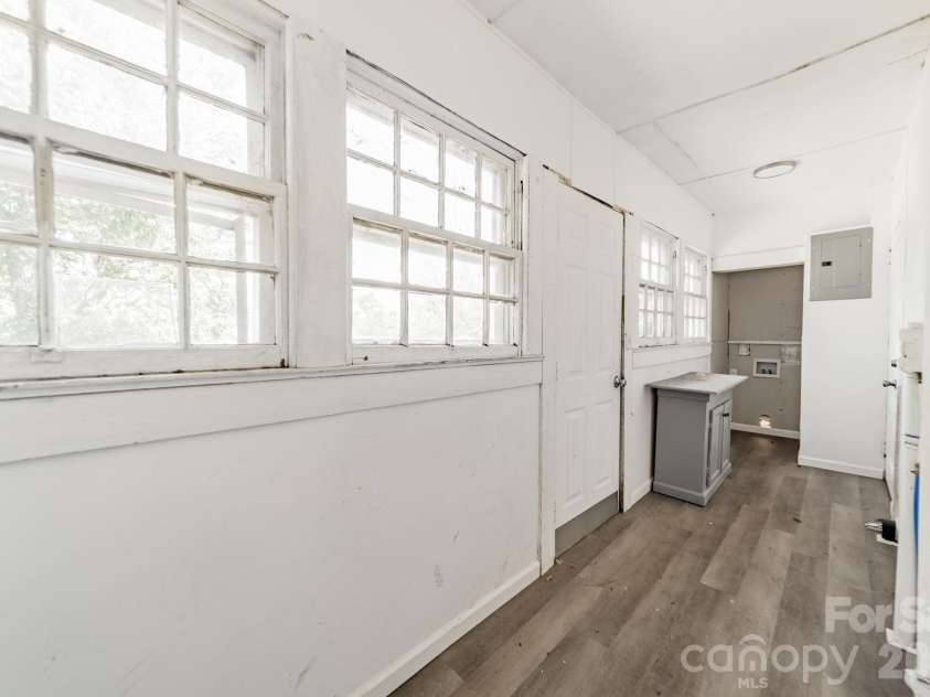 14 Mills Avenue, Concord, NC 28027.  MLS# CAR4403802, YatesRealty ID 42670. Downstairs Laundry