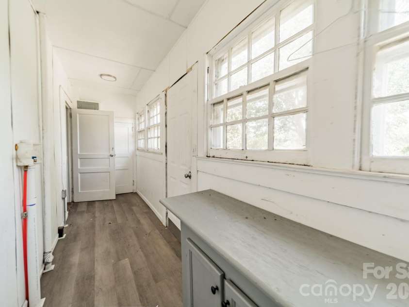 14 Mills Avenue, Concord, NC 28027.  MLS# CAR4403802, YatesRealty ID 42670. Downstairs Laundry