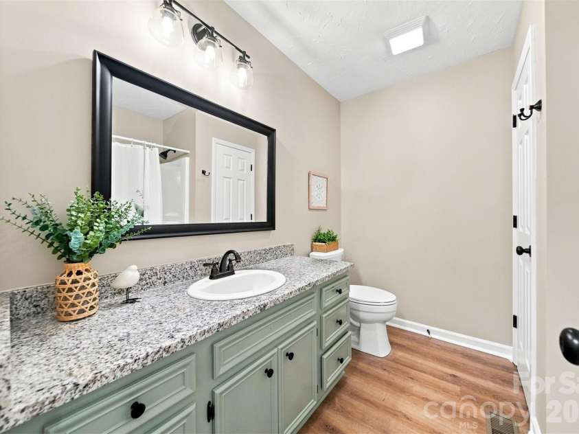 136 Cook Lane, Hickory, NC 28601.  MLS# CAR4412486, YatesRealty ID 42671. Hall bathroom on main level