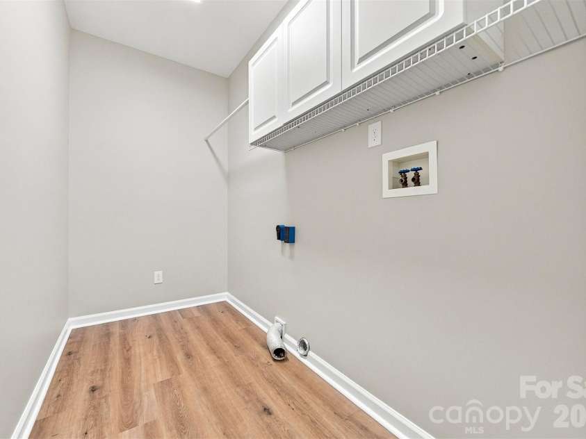 136 Cook Lane, Hickory, NC 28601.  MLS# CAR4412486, YatesRealty ID 42671. Laundry Room on main level off Kitchen