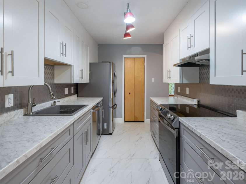 12 Peeler Drive, Asheville, NC 28803.  MLS# CAR4411996, YatesRealty ID 42677. 