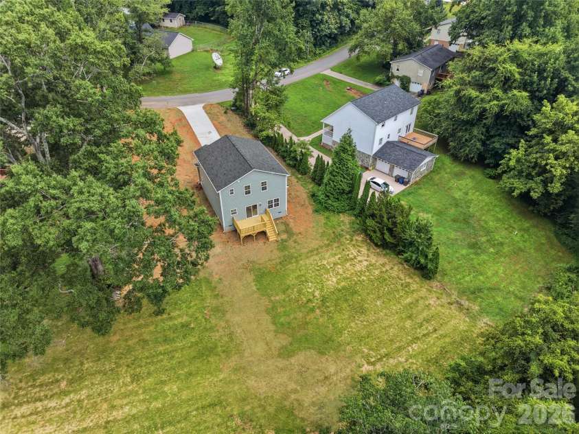 604 Sharon Drive, Statesville, NC 28625.  MLS# CAR4406361, YatesRealty ID 42684. Arial View - Back Yard / Home