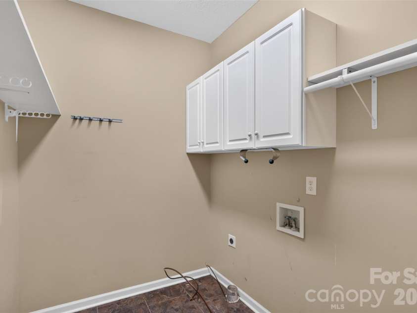 204 Whitegrove Drive, Fort Mill, SC 29715.  MLS# CAR4396185, YatesRealty ID 42686. Downstairs laundry