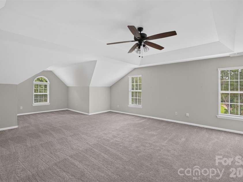 204 Whitegrove Drive, Fort Mill, SC 29715.  MLS# CAR4396185, YatesRealty ID 42686. Spacious primary bedroom