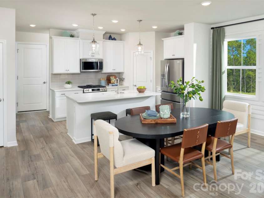 13161 Benessare Lane, Matthews, NC 28105.  MLS# CAR4412456, YatesRealty ID 42688. Representative kitchen dining