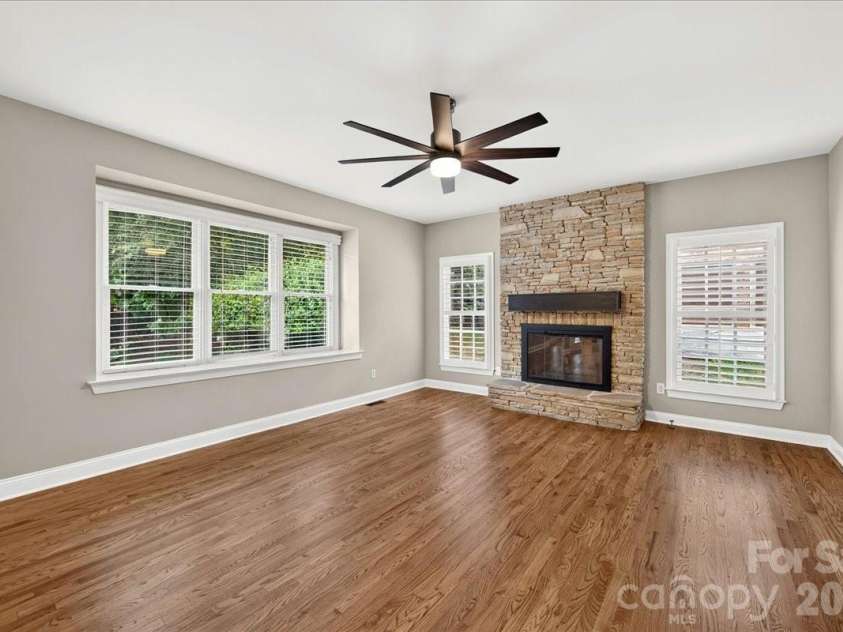 1308 Rockfish Drive, Matthews, NC 28105.  MLS# CAR4403442, YatesRealty ID 42691. Family Room with Gas Fireplace
