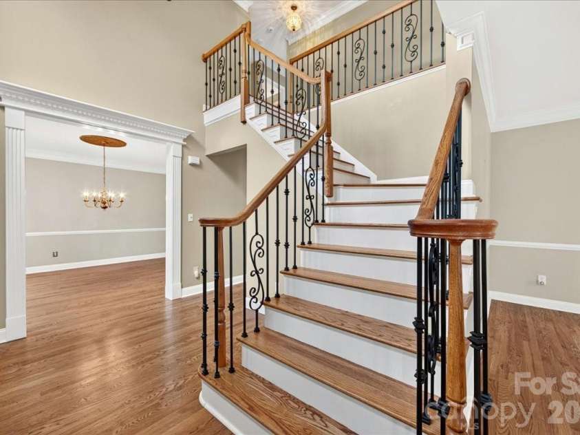1308 Rockfish Drive, Matthews, NC 28105.  MLS# CAR4403442, YatesRealty ID 42691. Foyer and Dining Room
