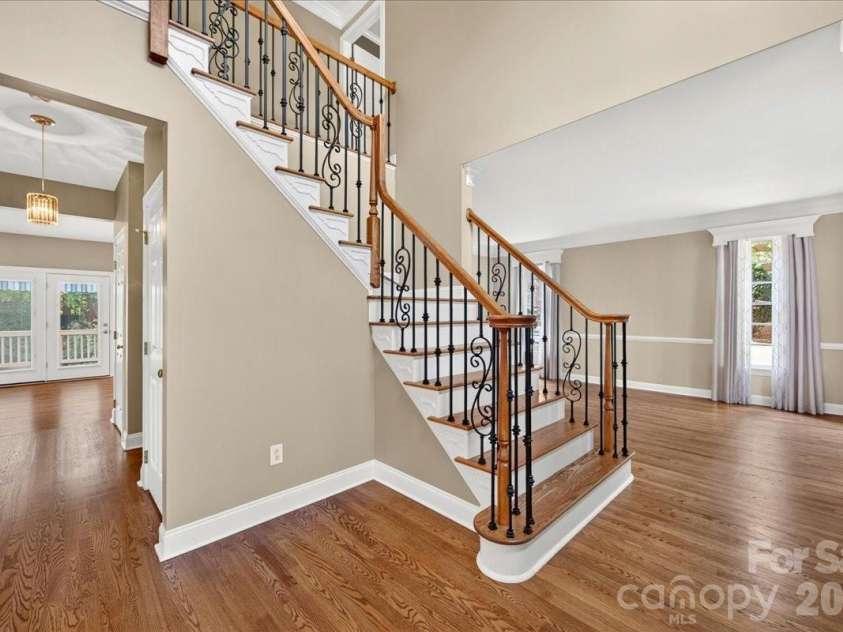 1308 Rockfish Drive, Matthews, NC 28105.  MLS# CAR4403442, YatesRealty ID 42691. Foyer and Formal Living Room