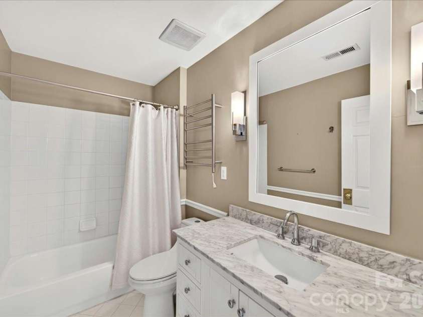 1308 Rockfish Drive, Matthews, NC 28105.  MLS# CAR4403442, YatesRealty ID 42691. Hallway Bathroom with Marble Vanity top