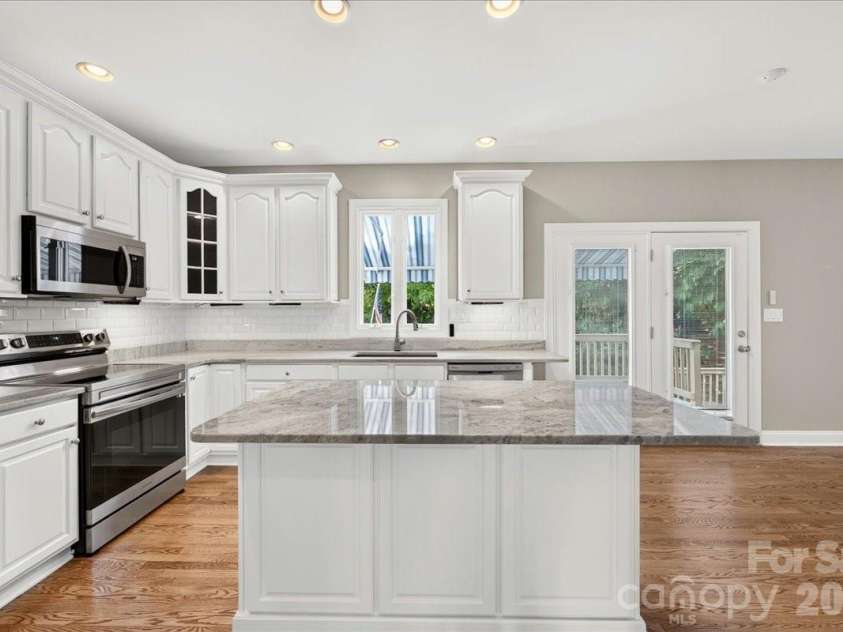 1308 Rockfish Drive, Matthews, NC 28105.  MLS# CAR4403442, YatesRealty ID 42691. Large Island