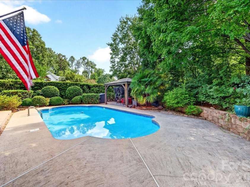 1308 Rockfish Drive, Matthews, NC 28105.  MLS# CAR4403442, YatesRealty ID 42691. Saltwater Pool