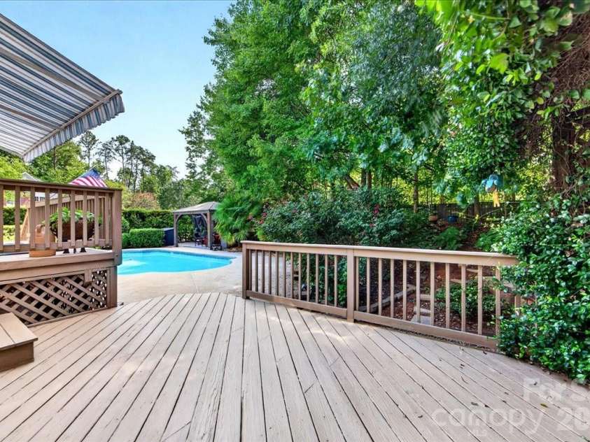 1308 Rockfish Drive, Matthews, NC 28105.  MLS# CAR4403442, YatesRealty ID 42691. Spacious deck