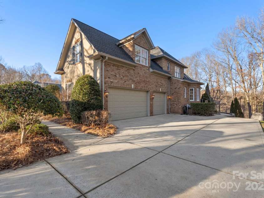 5752 Natoma Road, Lake Wylie, SC 29710.  MLS# CAR4200891, YatesRealty ID 4271. 3 Car Sideload Garage