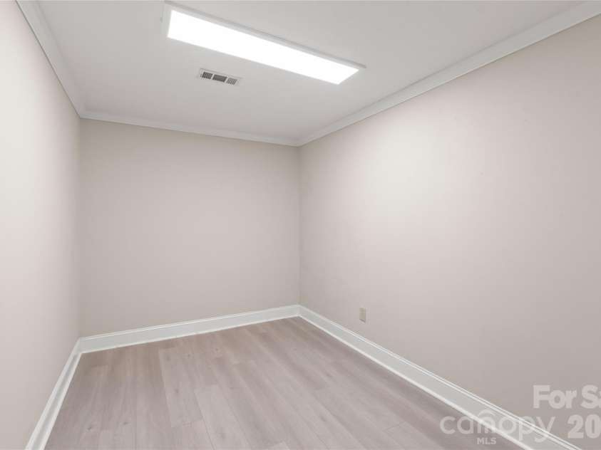 7308 Quail Ridge Drive, Charlotte, NC 28226.  MLS# CAR4405785, YatesRealty ID 42718. Basement Office