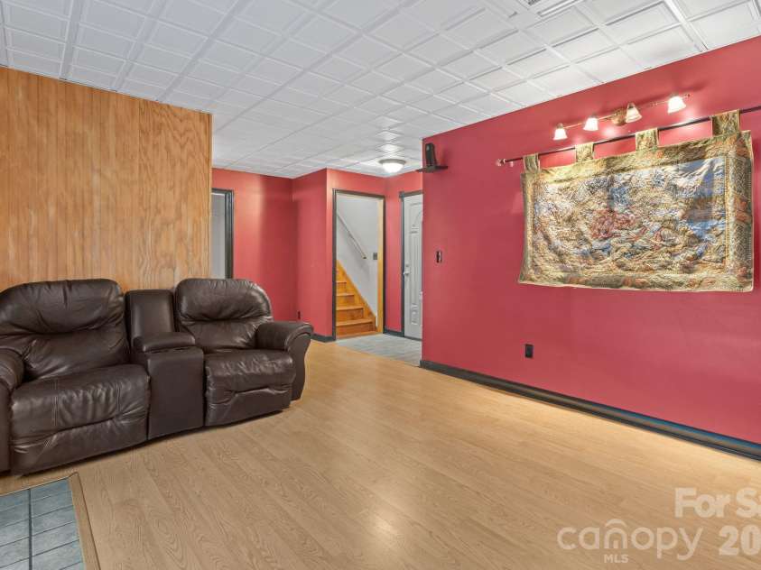 6 Pleasant Run, Asheville, NC 28806.  MLS# CAR4409837, YatesRealty ID 42719. Lower level den/flex space.