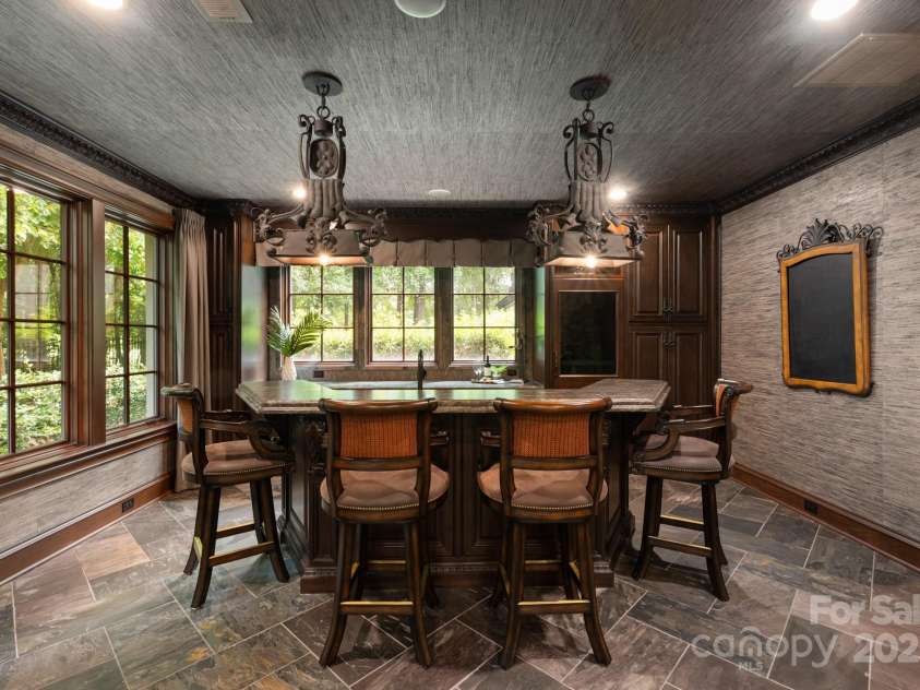 423 Oakmont Lane, Waxhaw, NC 28173.  MLS# CAR4177308, YatesRealty ID 4272. Lower level bar