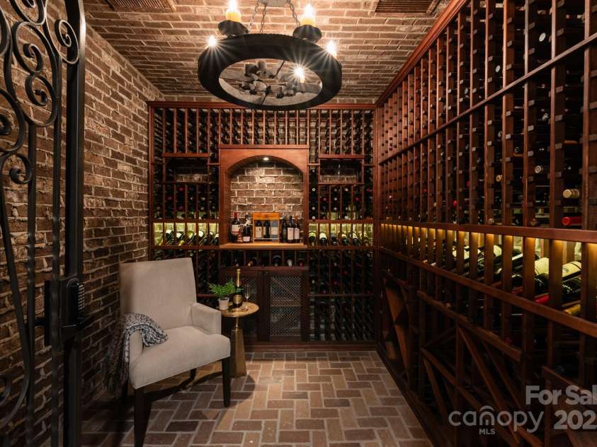 423 Oakmont Lane, Waxhaw, NC 28173.  MLS# CAR4177308, YatesRealty ID 4272. Lower level wine room