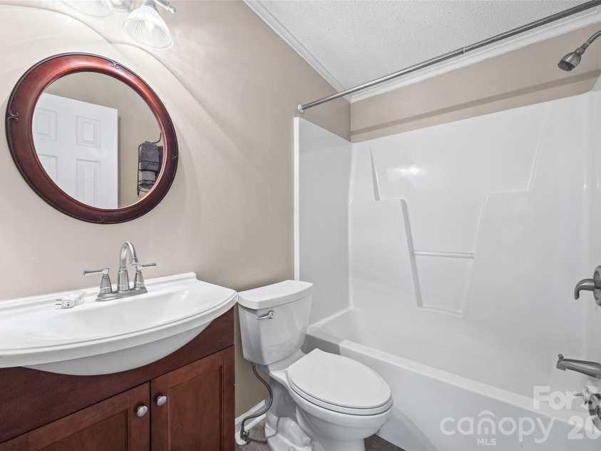 6860 Mandarin Drive, Rock Hill, SC 29732.  MLS# CAR4412258, YatesRealty ID 42721. Hall Bathroom