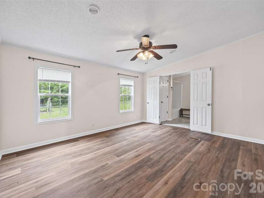 6860 Mandarin Drive, Rock Hill, SC 29732.  MLS# CAR4412258, YatesRealty ID 42721. Primary Bedroom