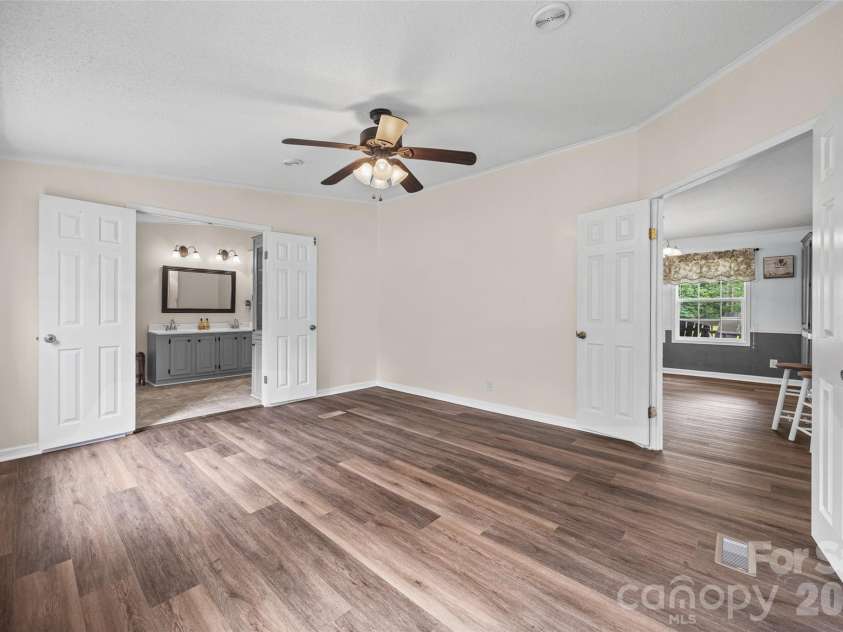 6860 Mandarin Drive, Rock Hill, SC 29732.  MLS# CAR4412258, YatesRealty ID 42721. Primary Bedroom