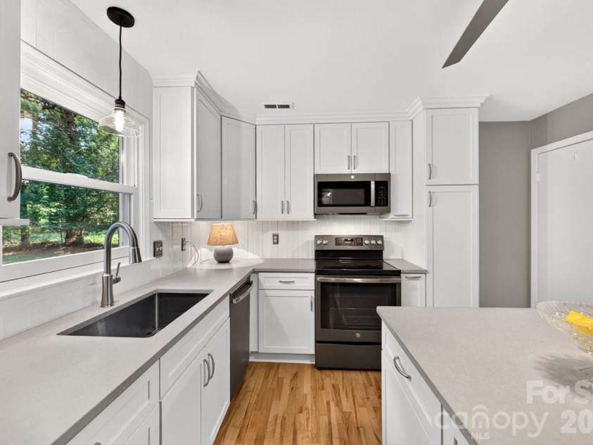 1101 Lightwood Drive, Matthews, NC 28105.  MLS# CAR4406930, YatesRealty ID 42723. 