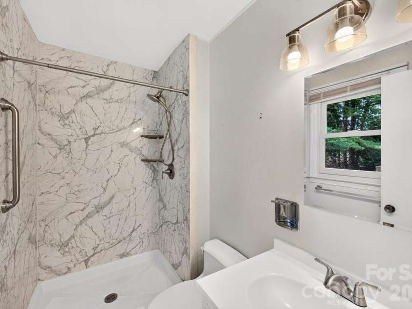 1101 Lightwood Drive, Matthews, NC 28105.  MLS# CAR4406930, YatesRealty ID 42723. 