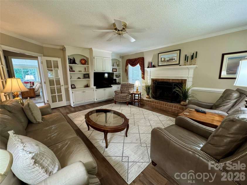 271 Ikerd Drive, Concord, NC 28025.  MLS# CAR4245802, YatesRealty ID 4274. Family room with built-ins