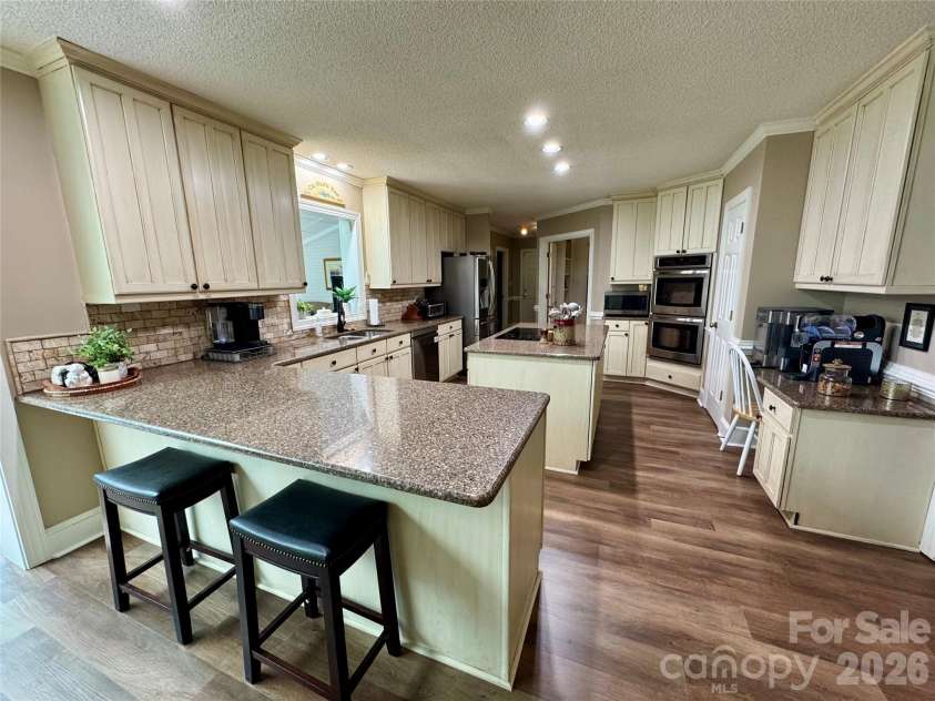 271 Ikerd Drive, Concord, NC 28025.  MLS# CAR4245802, YatesRealty ID 4274. Lots of space for all of the chef's in the family in this kitchen!