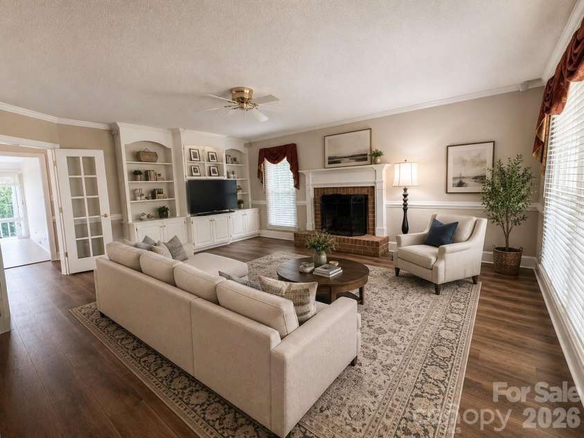 271 Ikerd Drive, Concord, NC 28025.  MLS# CAR4396759, YatesRealty ID 4274. Virtually staged family room