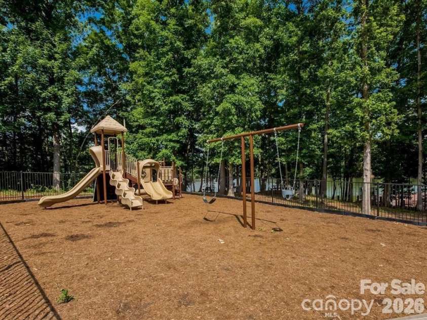 8621 Sequoia Grove Lane, Charlotte, NC 28214.  MLS# CAR4407064, YatesRealty ID 42751. Gated playground